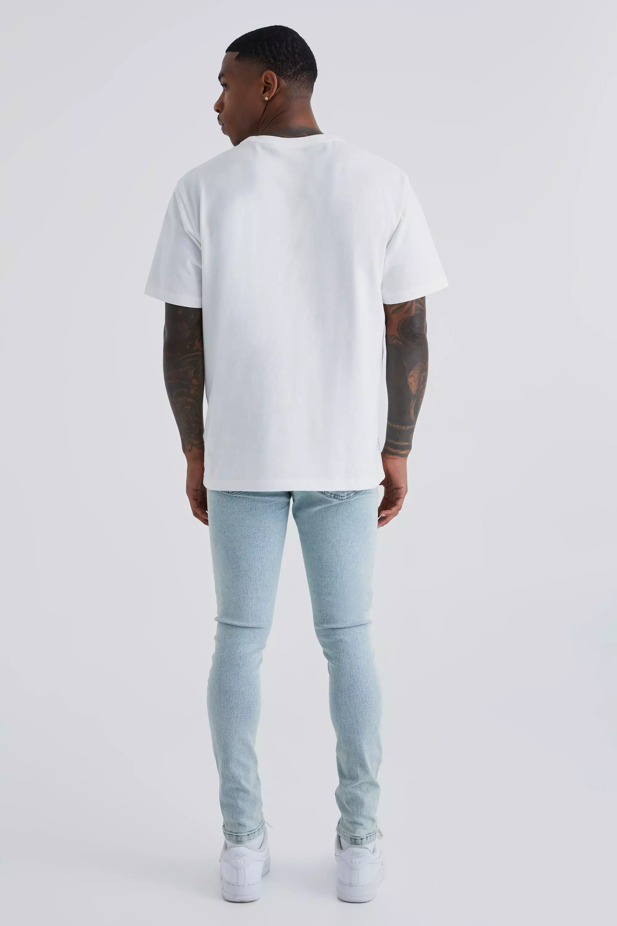 Super Skinny Jeans With All Over Rips boohooMAN